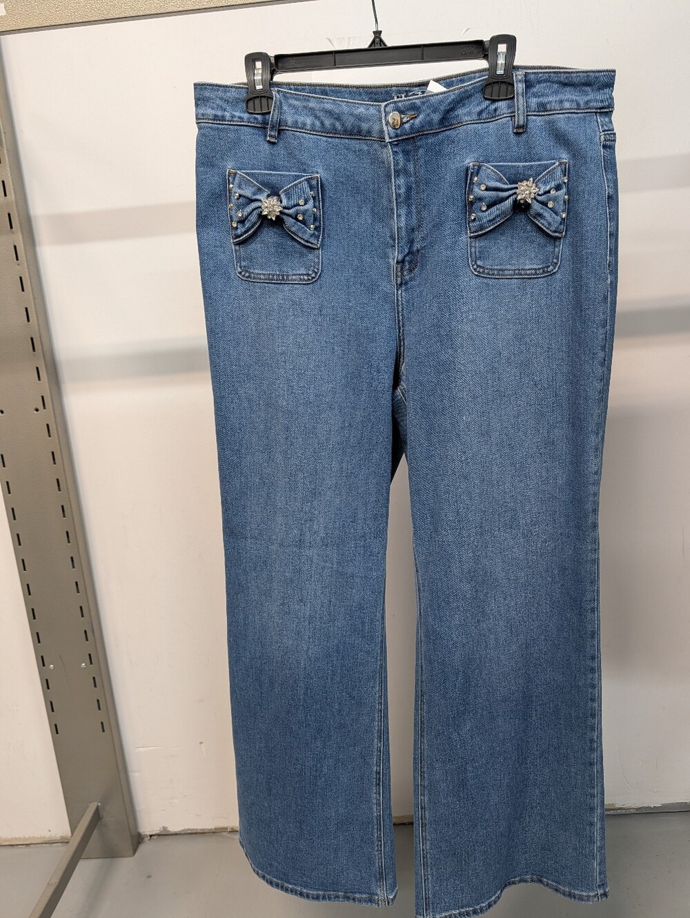 Frank Lyman Design Blue Wide-Leg Jeans with Bow Pocket Embellishments